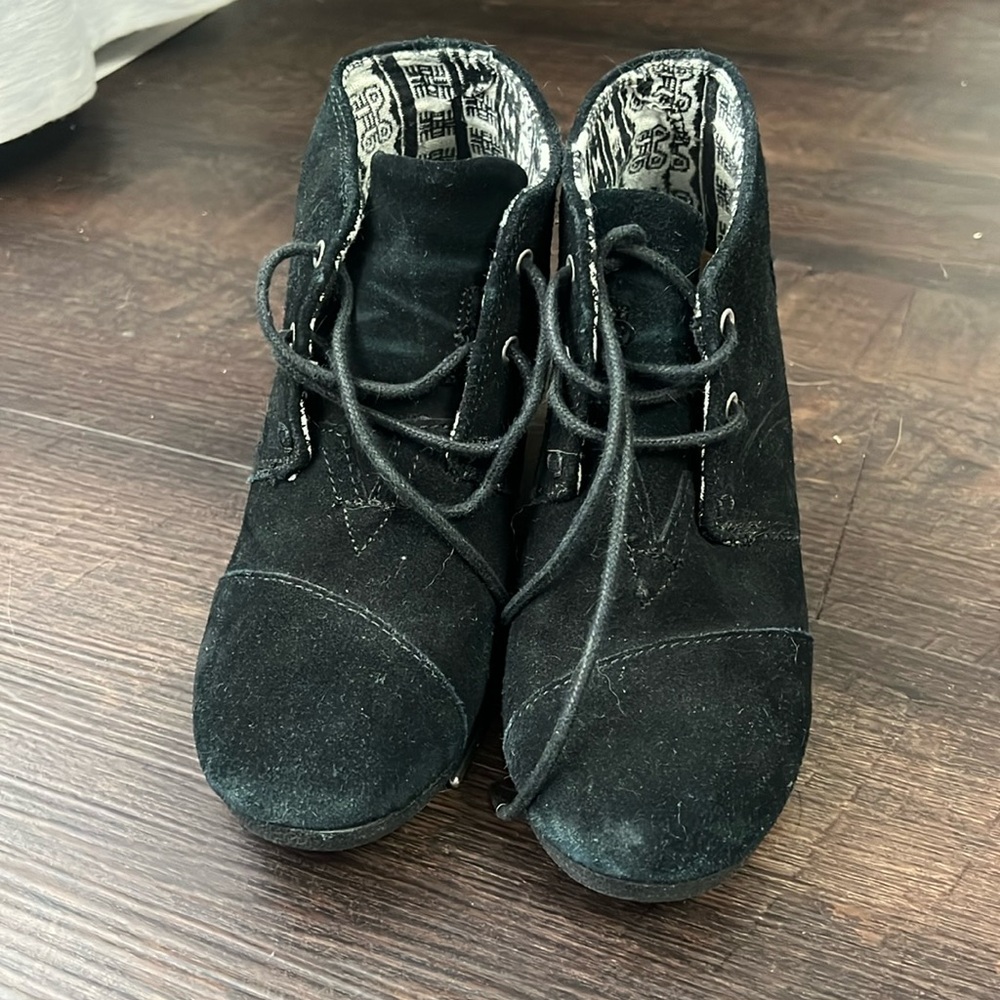 Closed toe black suede Toms wedges